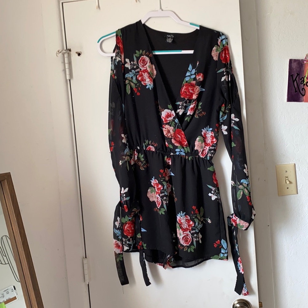 Black romper with floral print